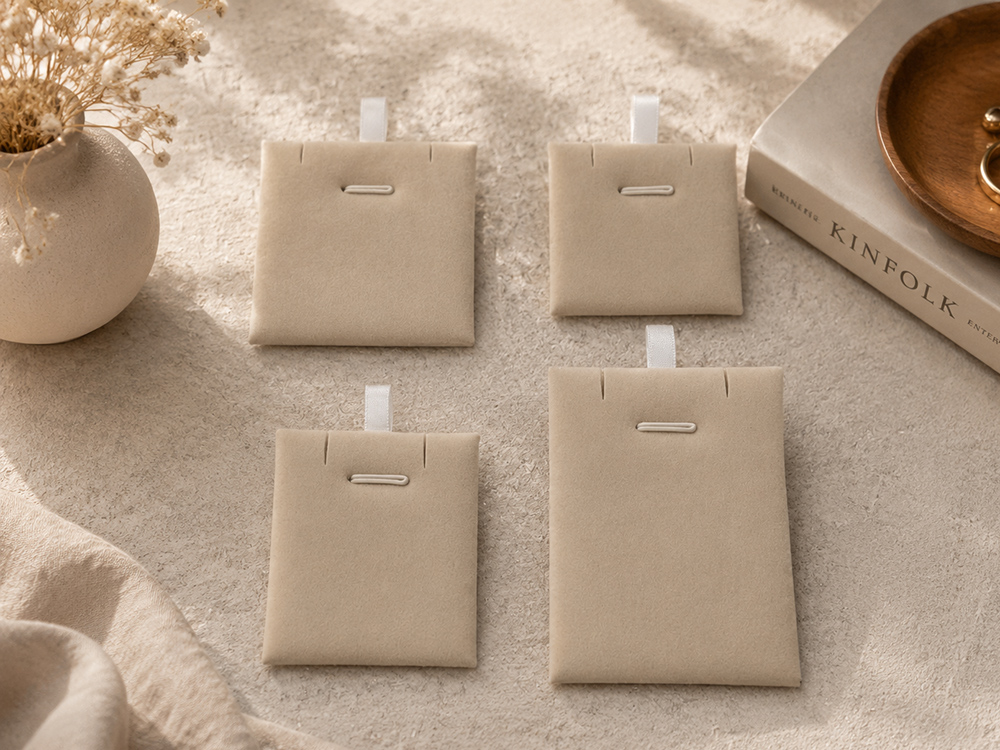 Microfiber suede jewelry pouches arranged for interior presentation.