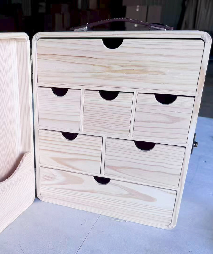 Wanuo development sample screenshot showing a wood organiser drawer layout and rounded frame.