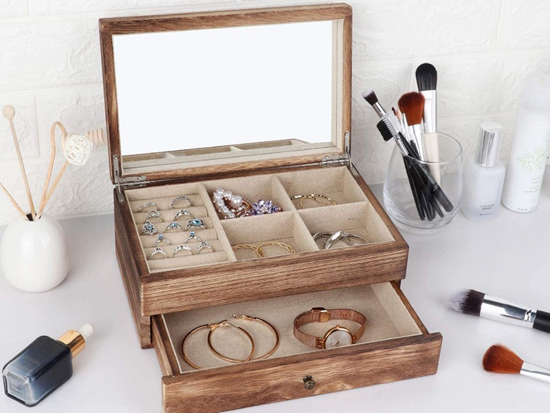 Paulownia Jewelry Collection Box custom development direction Paulownia jewelry collection box with a mirror lid, compartments and a drawer for structured organization.